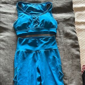 Buff Bunny Crossover sports bra and leggings. Royal blue both size small